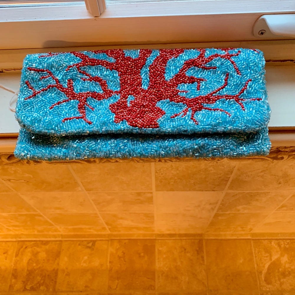 Monya clutch turquoise and red